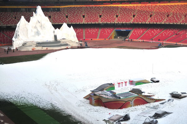 China&apos;s iconic national stadium, also known as the Bird&apos;s Nest is covered in artificial snow in Beijing on Dec. 13. The stadium has been turned into a winter playground at a cost of around 50 million yuan (US$7 million) in an effort to attract more tourists during the quieter Christmas and Chinese New Year season. [CFP]