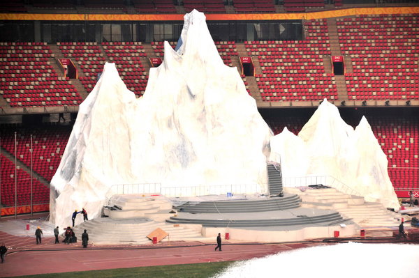 China&apos;s iconic national stadium, also known as the Bird&apos;s Nest is covered in artificial snow in Beijing on Dec. 13. The stadium has been turned into a winter playground at a cost of around 50 million yuan (US$7 million) in an effort to attract more tourists during the quieter Christmas and Chinese New Year season. [CFP]