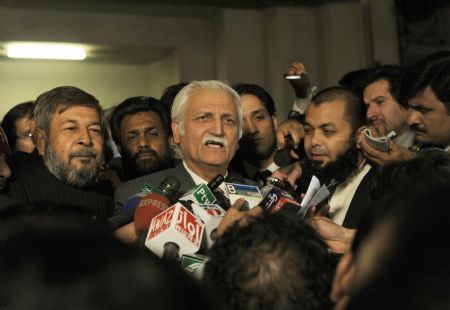 Farhatullah Babar, a spokesman for Pakistani President Asif Ali Zardari talks with media outside the supreme court in Islamabad. Pakistan&apos;s Supreme Court invalidated an amnesty Wednesday shielding senior government figures from prosecution, opening the door for corruption cases to be brought against the president&apos;s allies.[Xinhua/AFP]