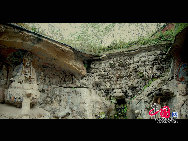 The Dazu Rock Carvings are a series of Chinese religious sculptures and carvings, dating back as far as the 7th century A.D., depicting and influenced by Buddhist, Confucian and Taoist beliefs. Listed as a World Heritage Site, the Dazu Rock Carvings are made up of 75 protected sites containing some 50,000 statues, with over 100,000 Chinese characters forming inscriptions and epigraphs. The sites are located in Chongqing Municipality within the steep hillsides throughout Dazu County. [Photo by Wu Changqing] 