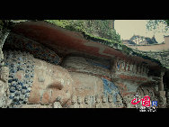 The Dazu Rock Carvings are a series of Chinese religious sculptures and carvings, dating back as far as the 7th century A.D., depicting and influenced by Buddhist, Confucian and Taoist beliefs. Listed as a World Heritage Site, the Dazu Rock Carvings are made up of 75 protected sites containing some 50,000 statues, with over 100,000 Chinese characters forming inscriptions and epigraphs. The sites are located in Chongqing Municipality within the steep hillsides throughout Dazu County. [Photo by Wu Changqing] 