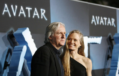 Director of the movie James Cameron and his wife Suzy Amis pose at the premiere of 