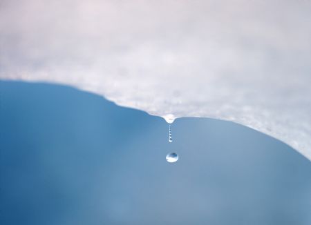 A drop of water falls from a melting piece of ice on Argentina&apos;s Perito Moreno glacier near the city of El Calafate, in the Patagonian province of Santa Cruz, December 16, 2009. Scientists warn that glaciers in the Andes are melting because of the effects of climate change. According to studies, these accumulations of ice are thawing at a pace so fast that they could disappear in 25 years.