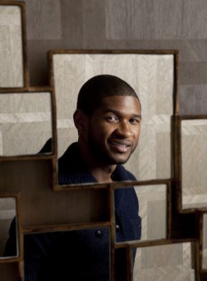 Singer Usher poses for a portrait to promote his new album and fragrance in New York December 16, 2009.