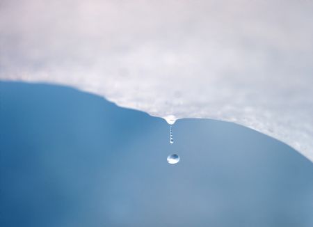 A drop of water falls from a melting piece of ice on Argentina's Perito Moreno glacier near the city of El Calafate, in the Patagonian province of Santa Cruz, December 16, 2009.