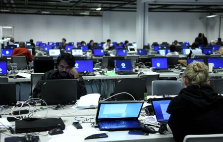 Journalists work at the Bella Center during the United Nations Climate Change Conference in Copenhagen, capital of Denmark, Dec. 19, 2009. 