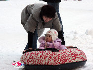 The operator of China's National Stadium, or the 'Bird's Nest', announced Saturday that 25,000 tons of snow for the Beijing Olympic stadium's first snow season carnival were made from harmless intermediate water. [Photo by YZ]