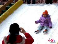 The operator of China's National Stadium, or the 'Bird's Nest', announced Saturday that 25,000 tons of snow for the Beijing Olympic stadium's first snow season carnival were made from harmless intermediate water. [Photo by YZ]