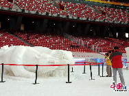 The operator of China's National Stadium, or the 'Bird's Nest', announced Saturday that 25,000 tons of snow for the Beijing Olympic stadium's first snow season carnival were made from harmless intermediate water. [Photo by YZ]