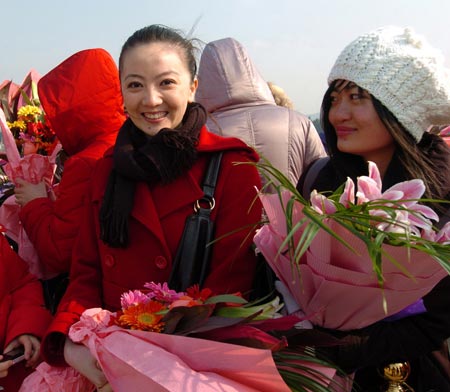 Family members of the officers and soldiers of the Chinese naval 3rd escort fleet attend a welcoming ceremony held in honour of 