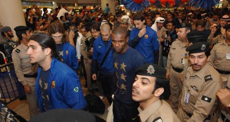 Barcelona FC team players arrive at the airport in Kuwait City December 20, 2009. Barcelona will play Kuwait&apos;s Kazma Sporting Club in a friendly soccer match on Monday.