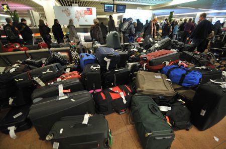 Photo taken on Dec. 20, 2009 shows luggage at an airport in Brussels, capital of Belgium.(Xinhua/Wu Wei)