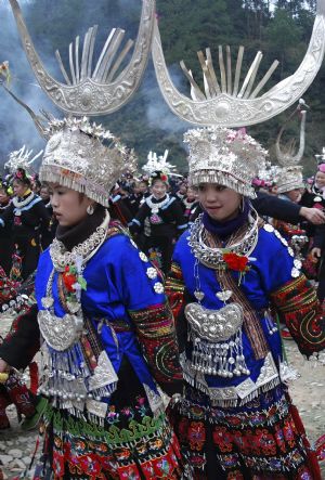 People of the Miao ethnic group perform traditional dance during the closing celebration of the Guzang Festival at Wuliu Village in Leishan County, southwest China&apos;s Guizhou Province, Dec. 19, 2009. The Guzang Festival, one of the grandest festivals of the Miao ethnic group to commemorate their ancestors, was held here from Nov. 27 to Dec. 19. (Xinhua/Chen Peiliang)