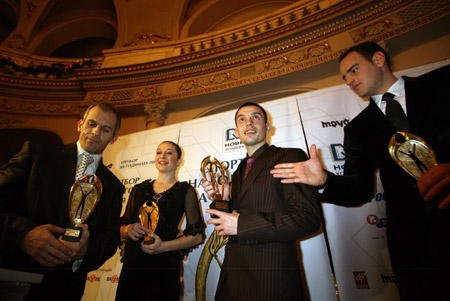 Detelin Dalakliev(R2), world champion of 54kg category in boxing, poses after he received the award Athlete of the Year 2009 of Bulgaria after the official ceremony under the patronage of Bulgarian President held at the National Theater Ivan Vazov in Sofia, Bulgaria, Dec. 21, 2009. 