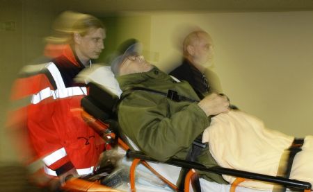 Accused Nazi death camp guard John Demjanjuk arrives in a court house in Munich December 22, 2009. The trial of Demjanjuk, an 89-year-old former U.S. auto worker, facing charges he helped force 27,900 Jews into gas chambers in Sobibor extermination camp in 1943, resumed on Monday. 