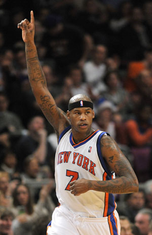 New York Knicks forward Al Harrington celebrates after he hit a three-point shot against the Chicago Bulls in the fourth quarter of their NBA basketball game at Madison Square Garden in New York, December 22, 2009. 