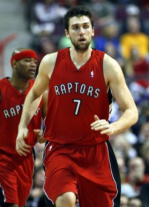 Toronto Raptors center Andrea Bargnani moves back down the court after scoring against the Detroit Pistons during the second half of their NBA basketball game in Auburn Hills, Michigan December 23, 2009.