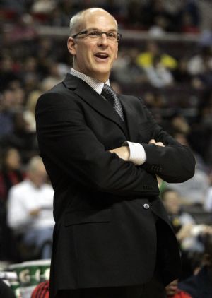 Toronto Raptors head coach Jay Triano watches from the bench during the second half of their NBA basketball game against the Detroit Pistons in Auburn Hills, Michigan December 23, 2009. 