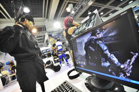 People dressed in game characters perform on the WMG3 Digital Game Expo in the Zhejiang World Trade International Center in Hangzhou, east China&apos;s Zhejiang Province, Dec. 24, 2009. The expo lasts from Dec. 24 to 27 with mainstream game products with digital interactive entertainment technologies. (Xinhua/Li Zhong)