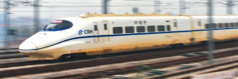 A bullet train runs on the Wuhan-Guangzhou high-speed railway on Thursday.[Zhou Chao/China Daily]