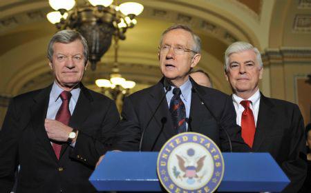 US Senate majority leader Harry Reid (C) speaks during a news conference in Washington Dec. 24, 2009. [Zhang Yan/Xinhua]