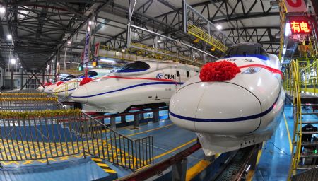 A high-speed train stops at the high-speed railway maintenance base in Wuhan, capital of central China's Hubei Province, Dec. 26, 2009. [Xinhua/Cheng Min]
