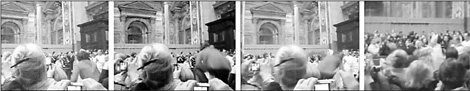 This sequence of images taken from amateur video shows an unidentified woman jumping over a barrier and grabbing Pope Benedict XVI as a guard pulls her down, while the pope walks down the main aisle to begin Christmas Eve mass in St. Peter's Basilica in Vatican City on Thursday.