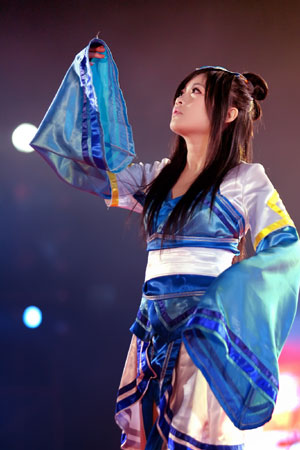 A contestant performs on the stage at the final of 2009 Cosplay Competition held in Guilin, southwest China's Guangxi Zhuang Autonomous Region, Dec. 25, 2009. Over 30 teams took part in the competition and competed for champion, prizes of best styling, best performing team and best property.