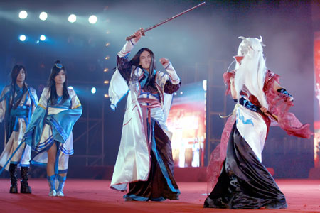 Contestants perform on the stage at the final of 2009 Cosplay Competition held in Guilin, southwest China's Guangxi Zhuang Autonomous Region, Dec. 25, 2009. Over 30 teams took part in the competition and competed for champion, prizes of best styling, best performing team and best property.