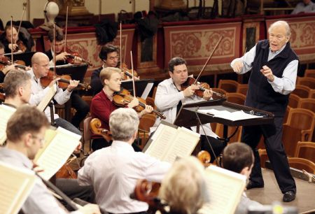 Maestro Georges Pretre conducts the Vienna Philharmonic Orchestra during a rehearsal for the New Year