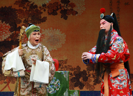 Peking Opera artists perform during a gala to mark the New Year at the National Center for the Performing Arts in Beijing, December 30, 2009.[Xinhua]