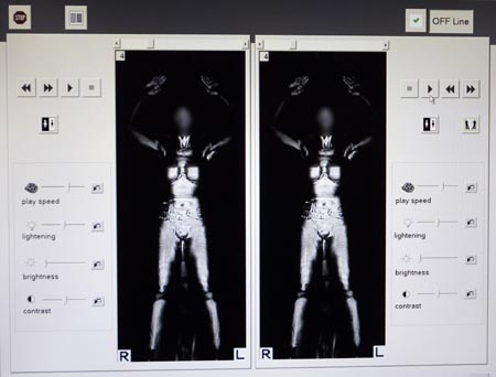 A computer monitor displays the full-body scan during a demonstration of passenger screening technology by the Transportation Security Administration, Wednesday, Dec. 30, 2009, at the TSA Systems Integration Facility of the United States.[Xinhua/Reuters]