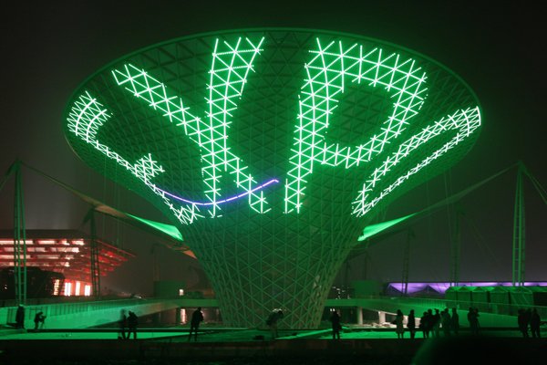 Photo taken on Dec. 30, 2009 shows the Sunshine Valley, one of the main buildings of 2010 Shanghai World Expo Park, being set on trial readjustment of overall illumination, in Shanghai, east China&apos;s Metropolis. [CFP]