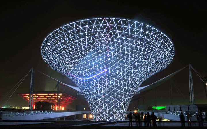 Photo taken on Dec. 30, 2009 shows the Sunshine Valley, one of the main buildings of 2010 Shanghai World Expo Park, being set on trial readjustment of overall illumination, in Shanghai, east China&apos;s Metropolis. [Xinhua]