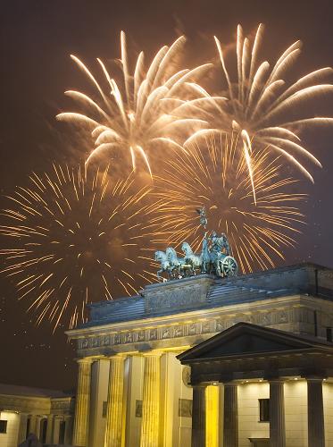 Fireworks explode over the quadriga of Berlin's landmark Brandenburg Gate to celebrate the New Year on January 1, 2010. 