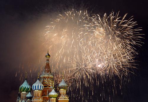 Fireworks explode over St. Basil cathedral on Red Square in Moscow, early January 1st, 2010. Some 120,000 Russians crowded overnight on Moscow's Red Square to toast the year 2010, as President Dmitry Medvedev thanked his nation for bearing with the economic crisis and evoked family values. 