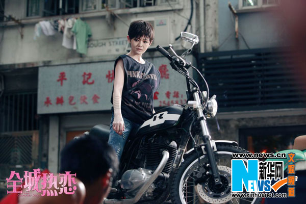 Short hair, smoky eyes, daring tattoos, black leather pants - Barbie Hsu went all out for her new romance film 'Hot Summer Days.'