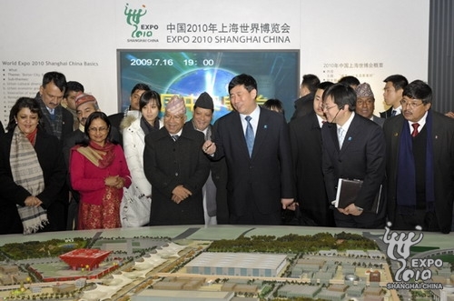 Nepali Prime Minister Madhav Kumar Nepal learns about the Expo's master plan.