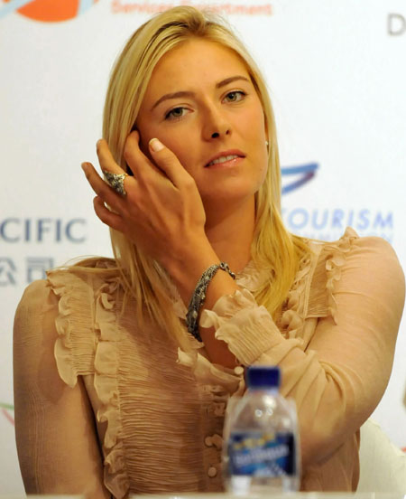 Maria Sharapova of the Russia team attends a press conference in Hong Kong, south China, Jan. 4, 2010. The Hong Kong Tennis Classic 2010 tournament will be held in Hong Kong on Jan. 6-9. Top tennis stars would represent four teams, namely Europe, Asia Pacific, Russia and the Americas in the tournament. (Xinhua/Lo Ping Fai)