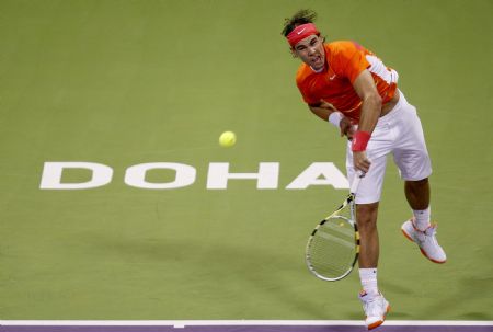 Spain's Rafael Nadal serves to Simone Bolelli of Italy during the ATP Qatar Open tennis tournament in Doha January 5, 2010. 