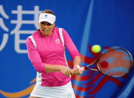 Russia's Vera Zvonareva returns the ball during the first round match of the Hong Kong Tennis Classic 2010 against Japan's Ayumi Morita of Team Asia Pacific in Hong Kong of south China on Jan. 6, 2010.