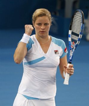 Belgium's Kim Clijsters celebrates beating Germany's Andrea Petkovic in their women's singles semi-final match at the Brisbane International tennis tournament January 8, 2010.