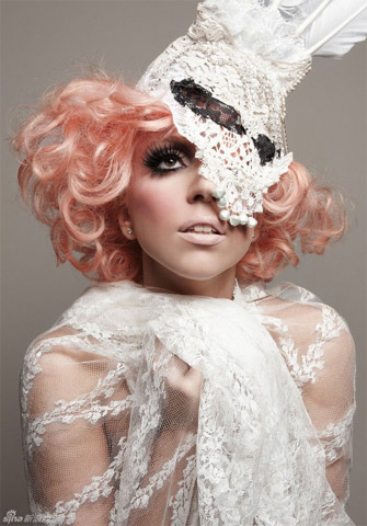 Lady Gaga sports an avant-garde grace style in fresh smoke-eye makeup and a delicate veil gown on the cover of 944 magazine's 2010 January issue.