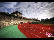 Xiamen University, colloquially known as Xia Da, located in Xiamen, Fujian Province, is the first university in China founded by overseas Chinese. Before 1949, it was named as : University of Amoy. The school motto: 'Pursue Excellence, Strive for Perfection'. This university rank is 13 in China. [Photo by Zhou Yunjie]