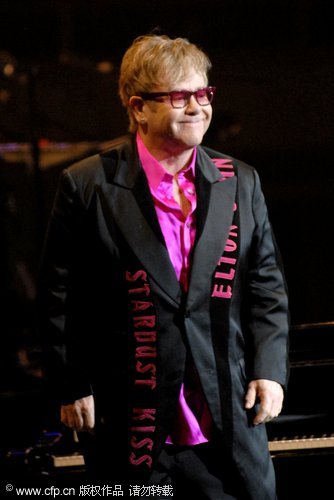 Elton John and Ray Cooper seen performing at the Blaisdell Arena in Honolulu, Hawaii. The pair haven't toured the US together since 1995.