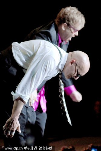 Elton John and Ray Cooper seen performing at the Blaisdell Arena in Honolulu, Hawaii. The pair haven't toured the US together since 1995.