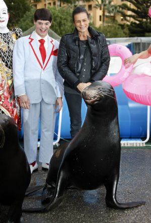 Princess Stephanie of Monaco (R) poses with clowns and sea lions two days before the opening of the 34th International Circus Festival of Monte Carlo, January 12, 2010. 