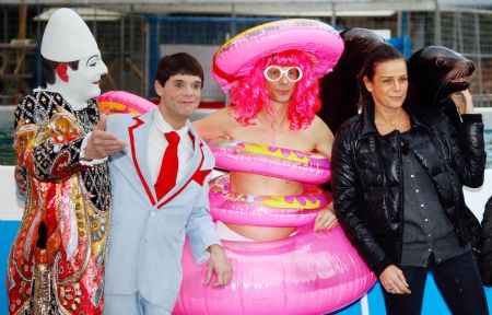 Princess Stephanie of Monaco (R) poses with clowns and sea lions two days before the opening of the 34th International Circus Festival of Monte Carlo, January 12, 2010.