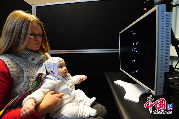 4-month-old Matai Reid with her mother Gemma, 33, taking part in research by Durham University at the Stockton-on-Tees campus to study the development of babies brains and to try and get a better understanding of how autism might occur. [CFP] 