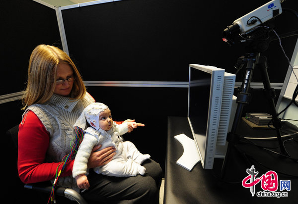 4-month-old Matai Reid with her mother Gemma, 33, taking part in research by Durham University at the Stockton-on-Tees campus to study the development of babies brains and to try and get a better understanding of how autism might occur. [CFP] 